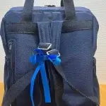 Sac à dos en toile bleue poches extérieures vue arrière