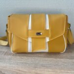 sac à main pour femme en similicuir haute couture jaune et blanc. Qualité du simili exceptionnelle.